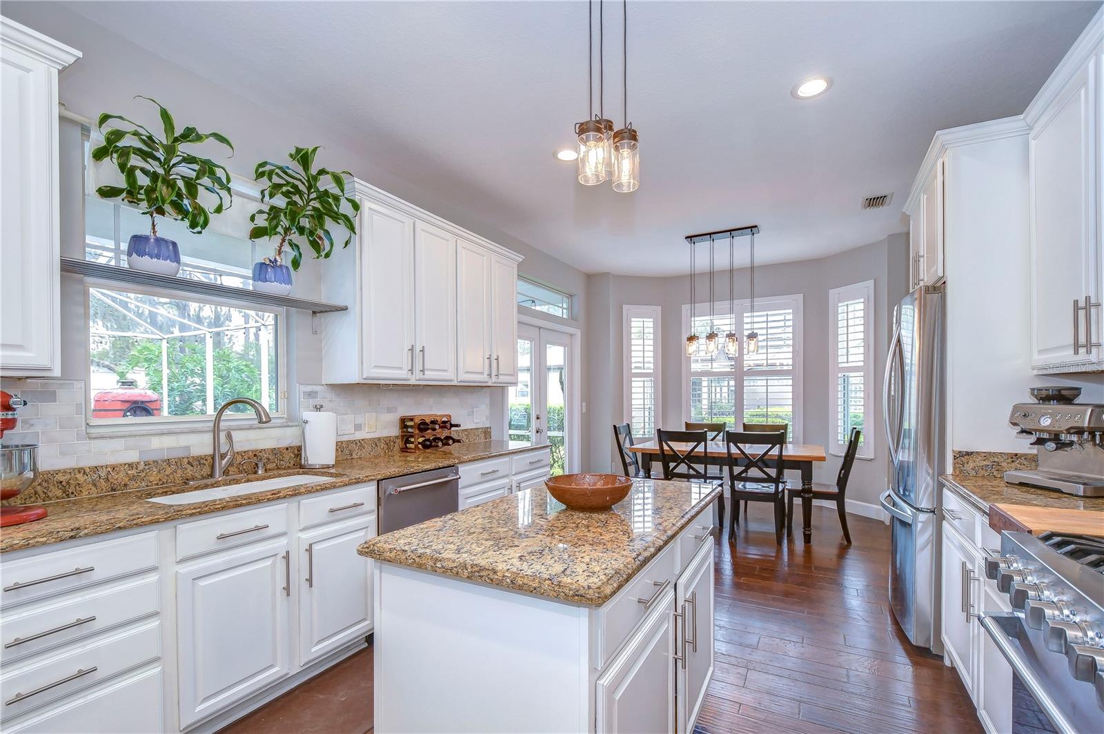 42” white cabinets, granite countertops and a walk-in pantry!