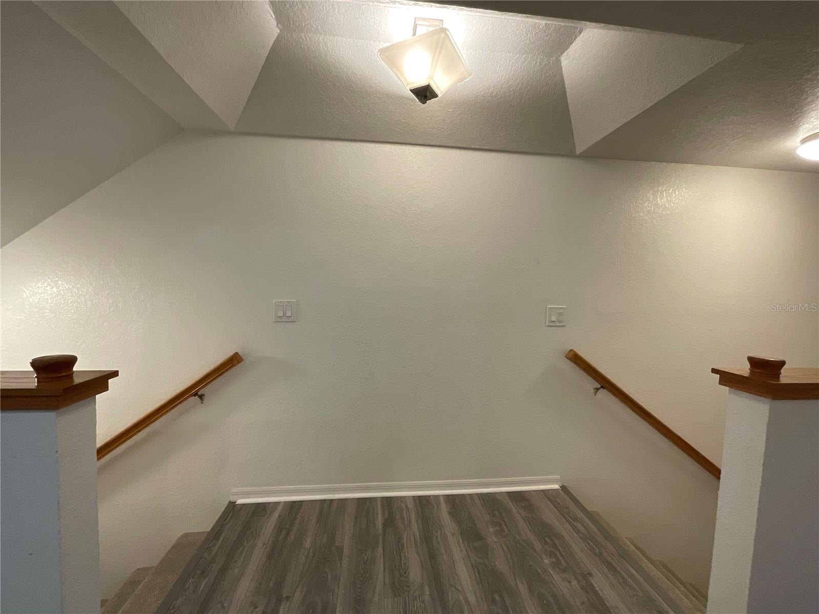 The Second Floor staircases. Right side to the front door, left side to the current 4th Bedroom, Bathroom, Large Family Room