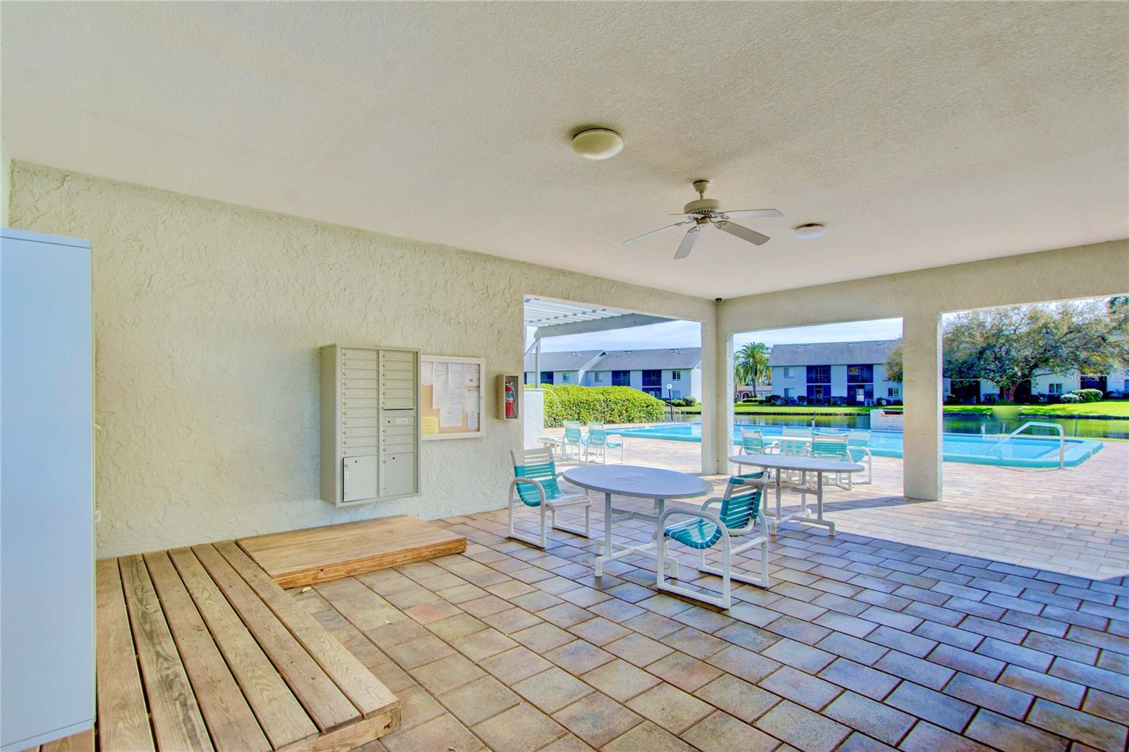 Owners private mailboxes in shady poolside terrace located steps away from #167 front door, so convenient!