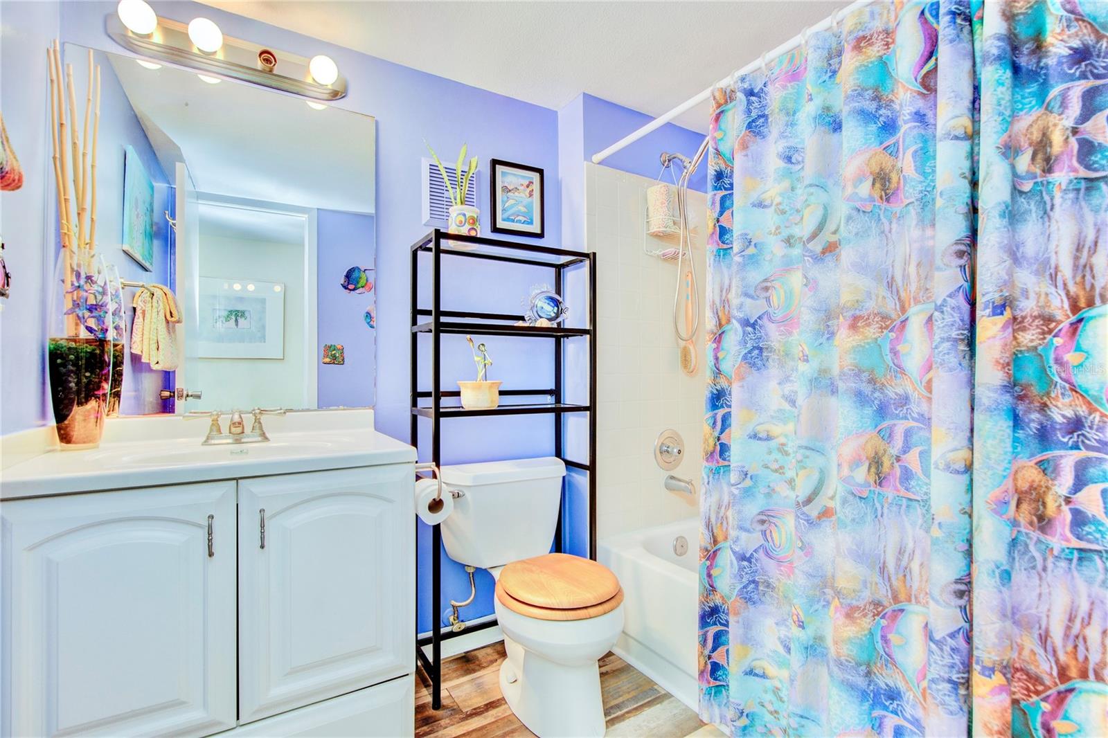 Guest Bath features tub/shower combo.