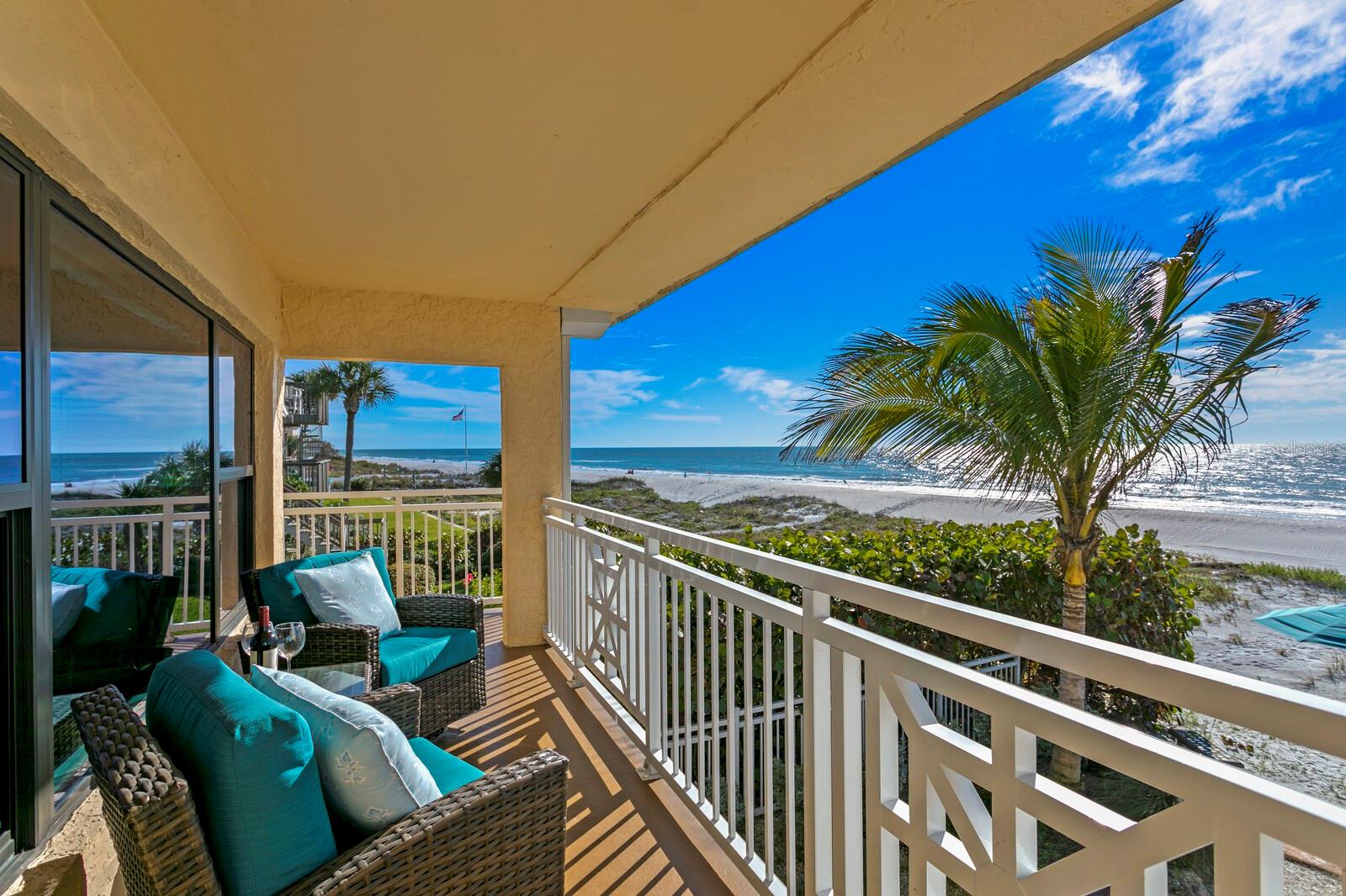 Upstairs covered balcony with custom railing as well as staircase private entry.  With a view like this, you'll never want to go inside!
