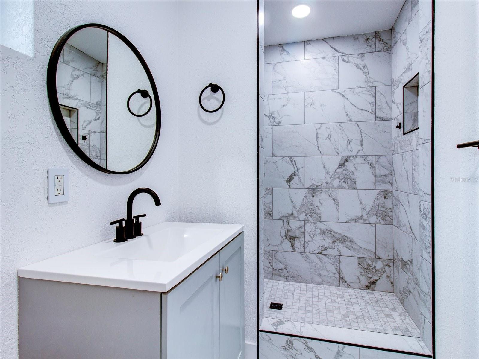 Bathroom 2 Vanity and Tiled Shower