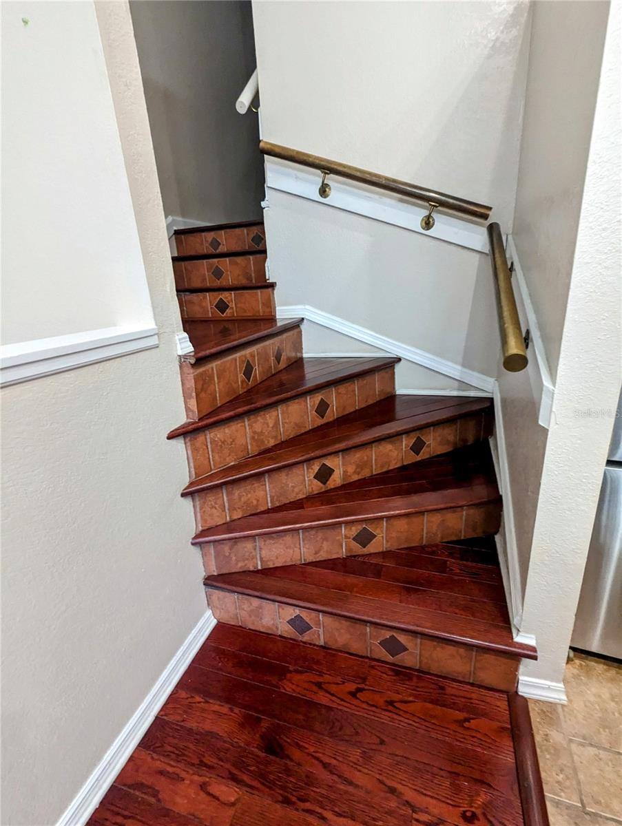 custom staircase leading up to third level