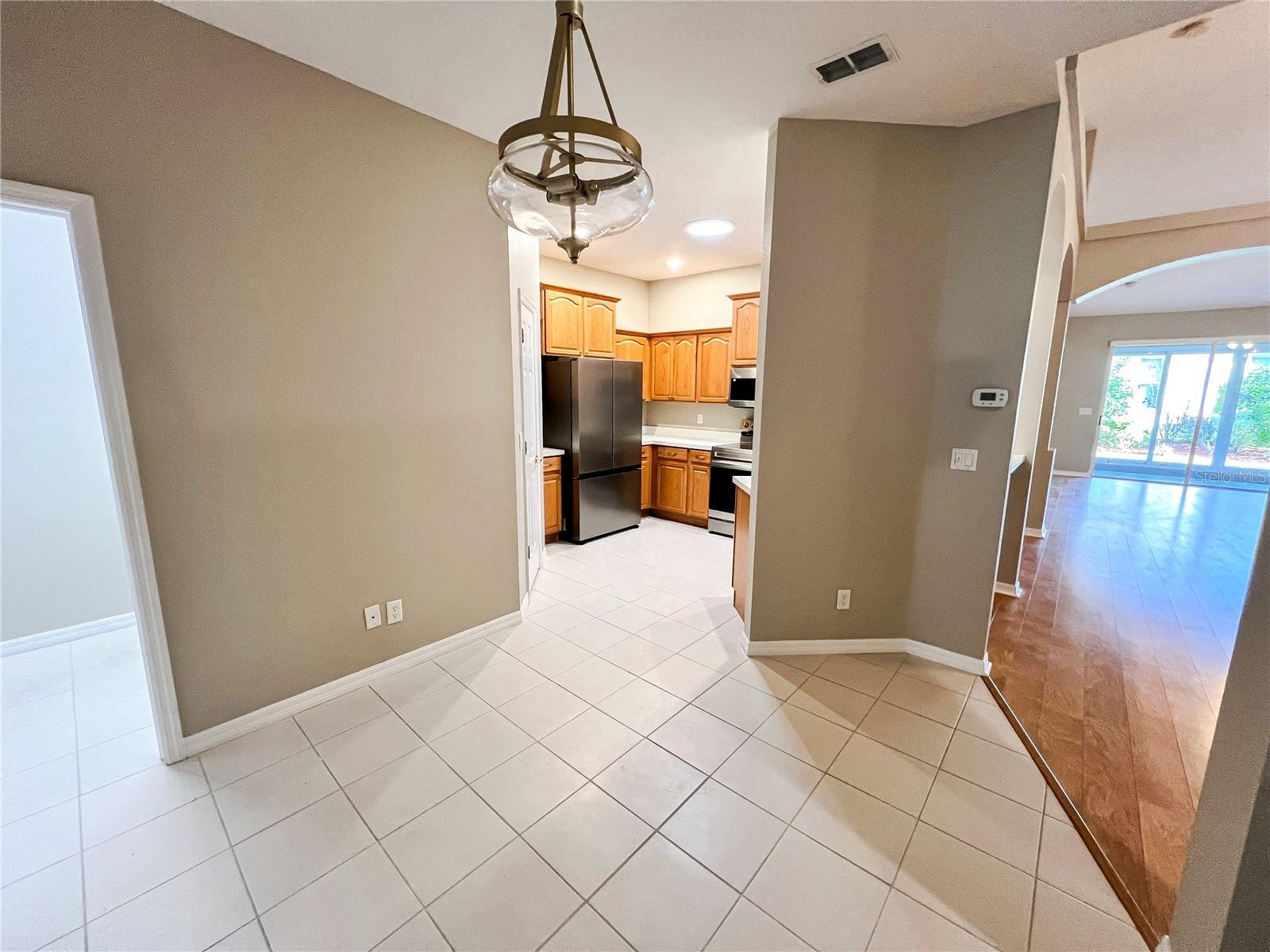 Enter from the one car garage into the Breakfast Nook with the laundry Room off to the side before you get to the kichen