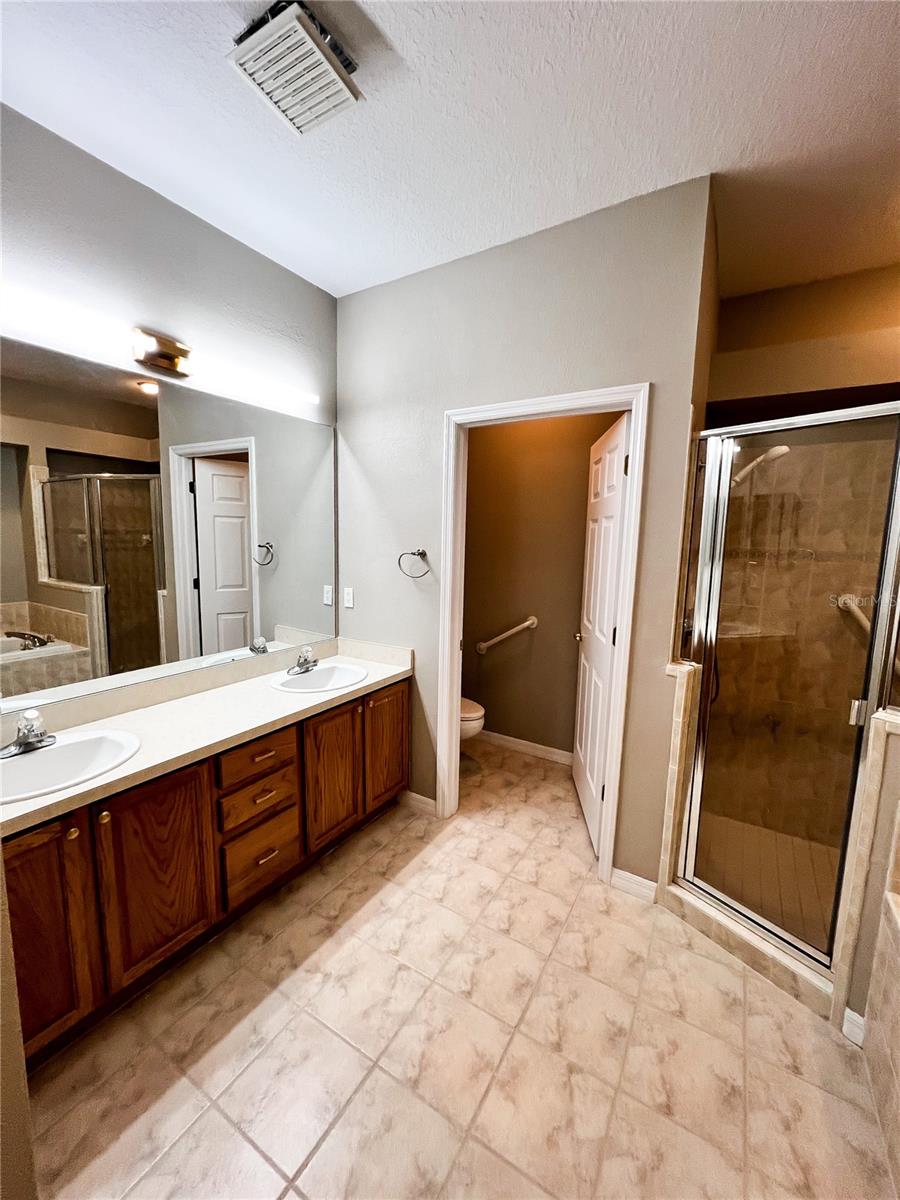 Double Sinks, updated lighting, a private water closet