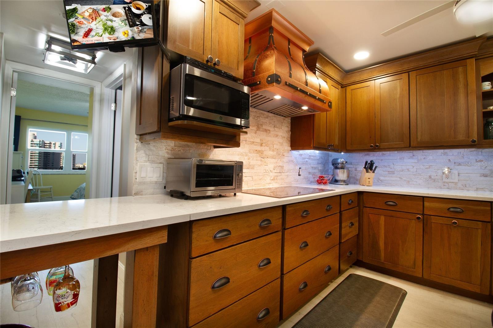 Gorgeous Cherry Cabinets with Quartz Countertops