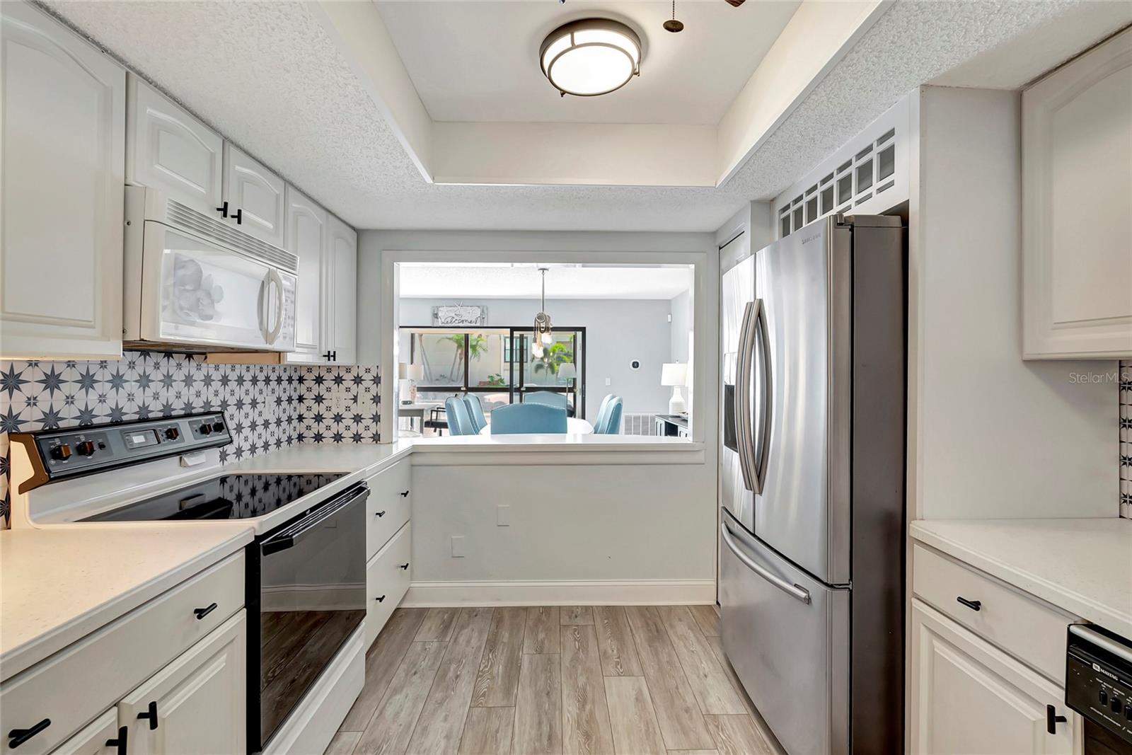 With sleek countertops, modern appliances, and ample storage space, this kitchen is as practical as it is stylish.