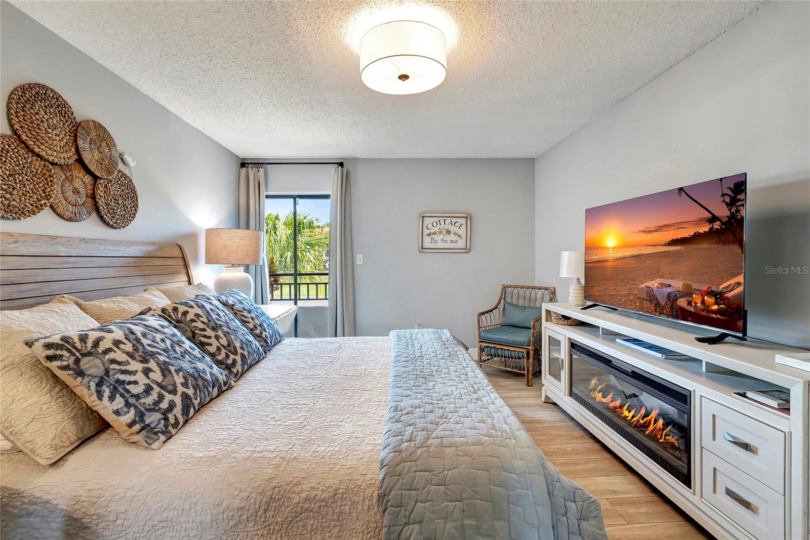 The primary bedroom is your sanctuary within our condo unit. Step inside and feel the stress of the day melt away as you're embraced by comfort and tranquility.