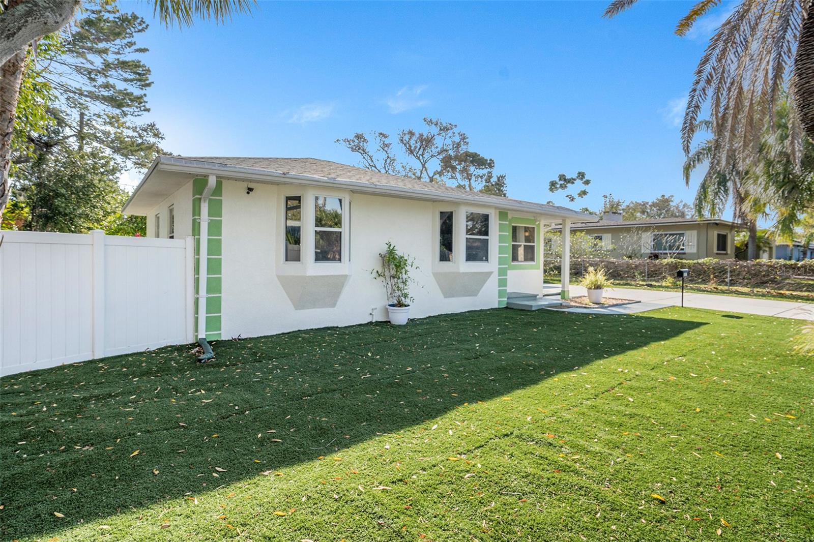 Front Greenspace w/Privacy Fence