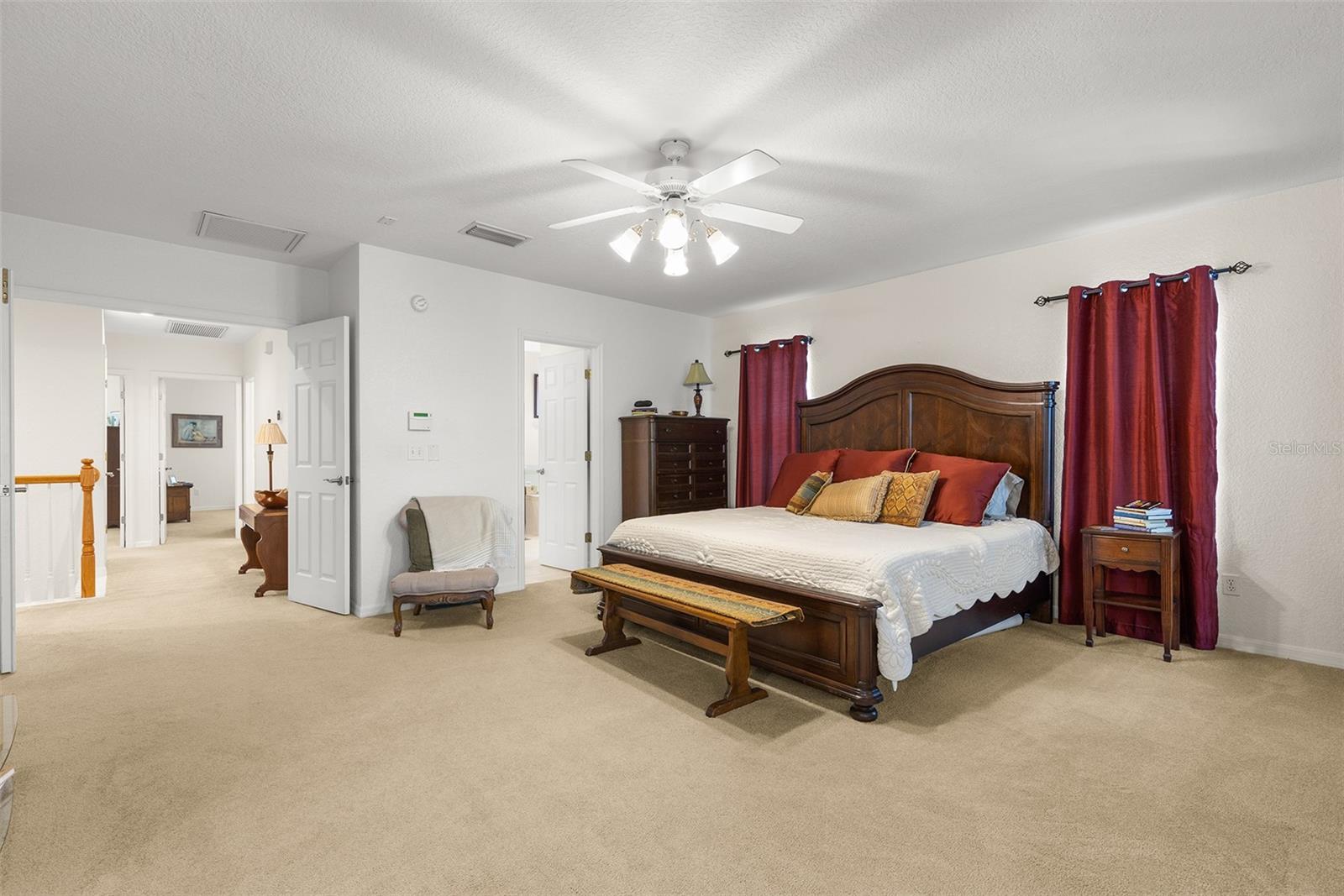 Double doors open to your relaxing Master suite that includes large bathroom, two walk-in closets, sitting space, and a porch