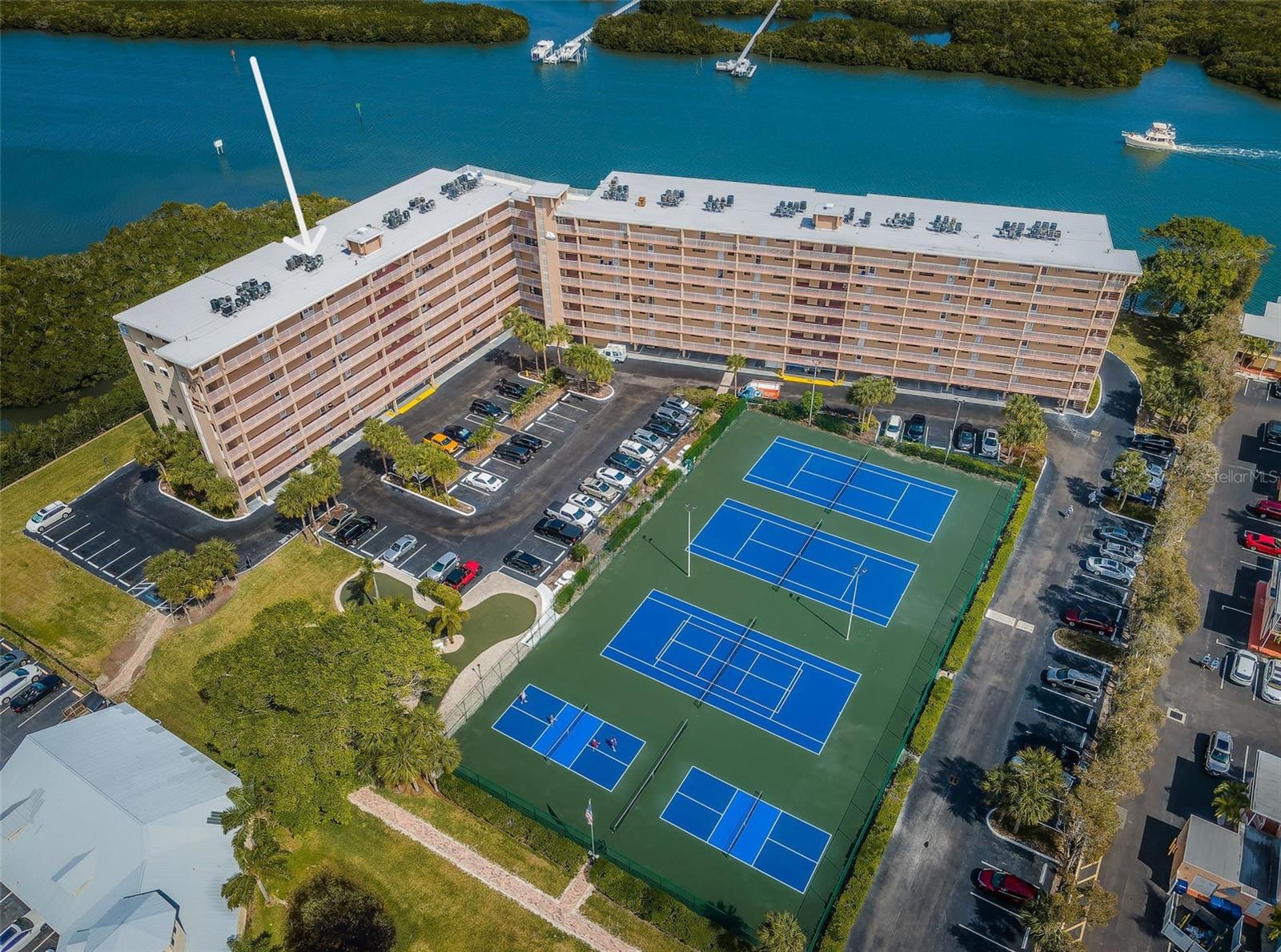 Bay Shores Yacht & Tennis Club with newly refurbished tennis & pickleball courts!