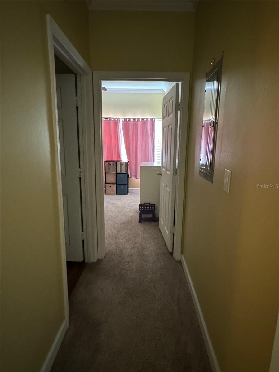 Hallway to 2nd bed and bath