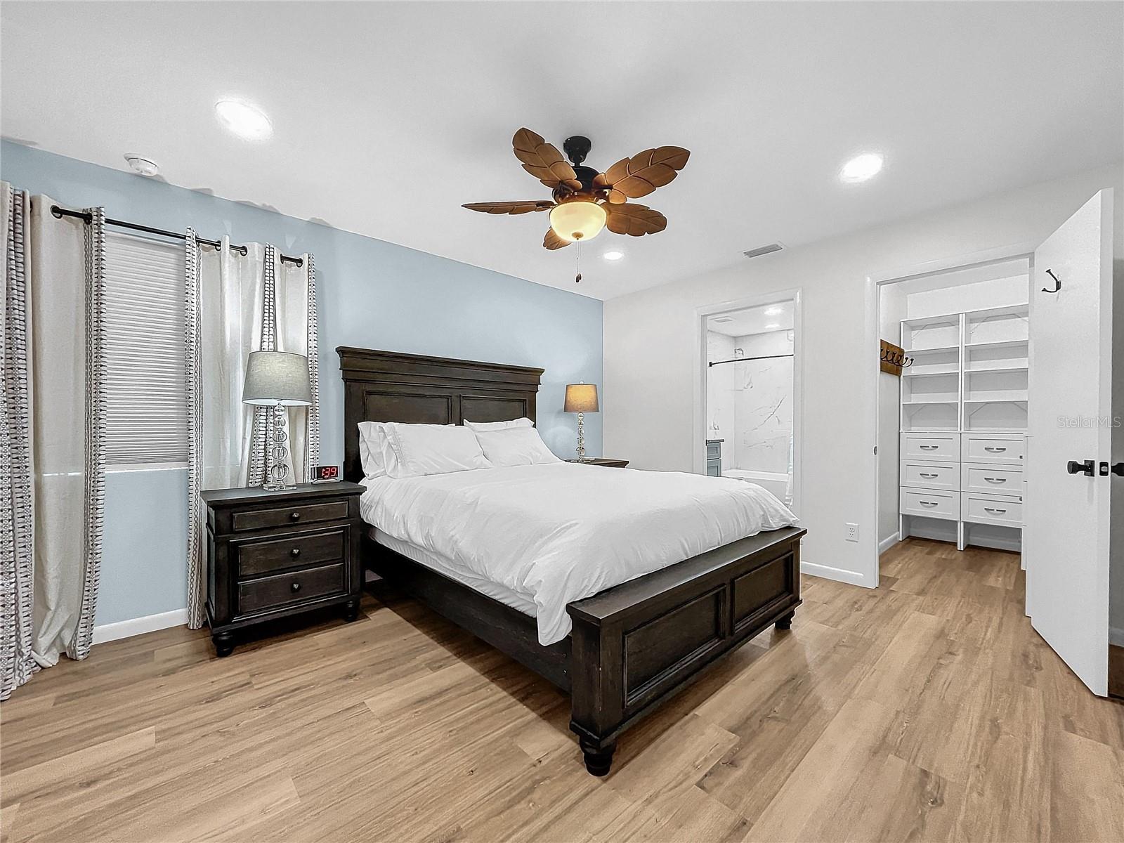 Master Bedroom with corner bedrooms, curtains and blinds, has ensuite and walk in closet