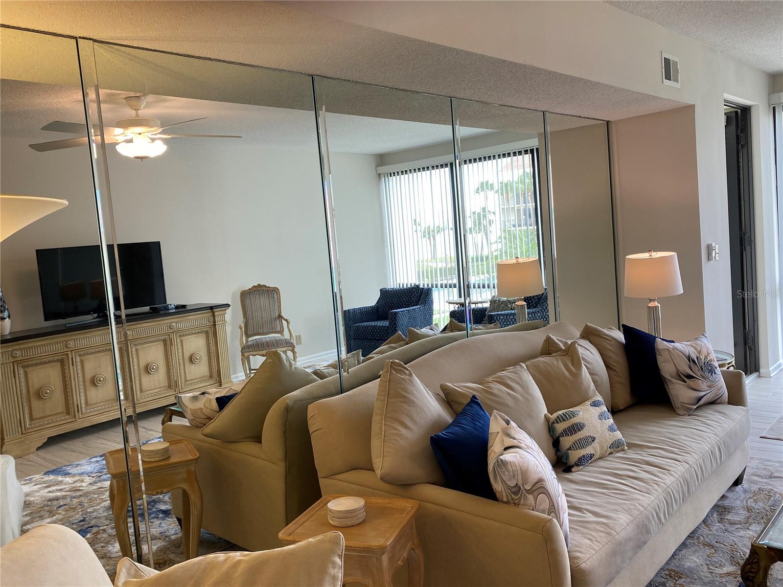 Water view is reflected in the mirrors.