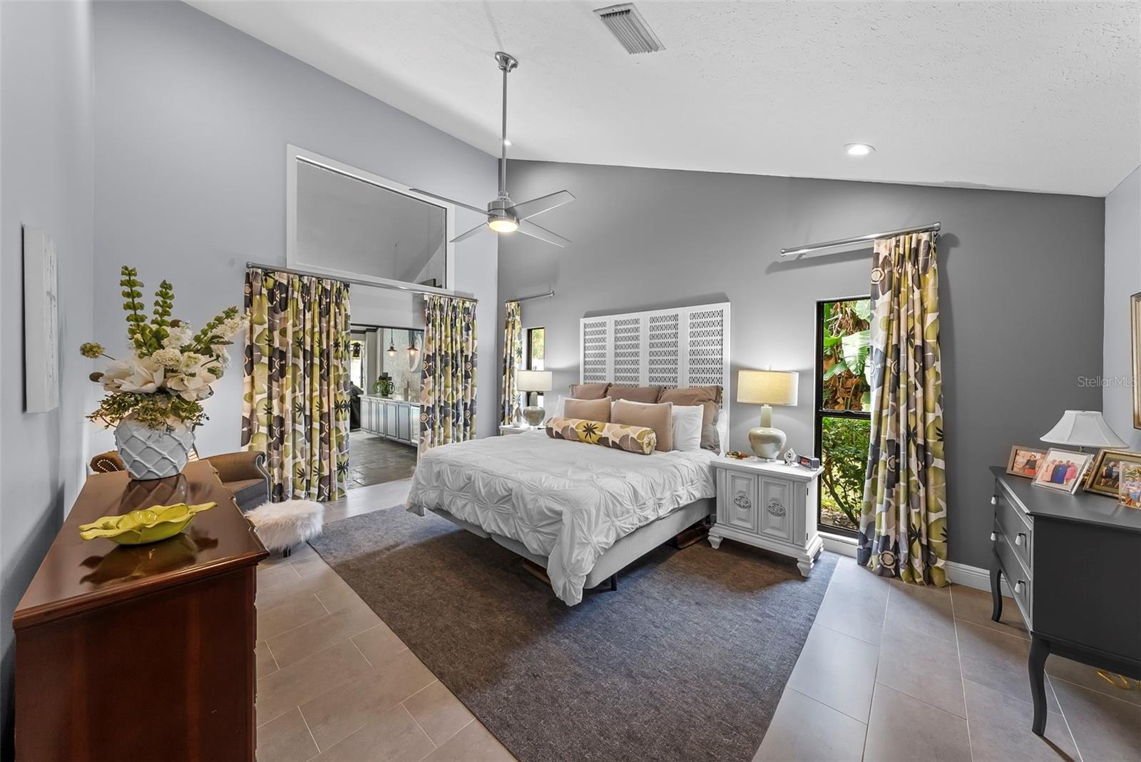 Primary suite is a DREAM bathed with natural light!