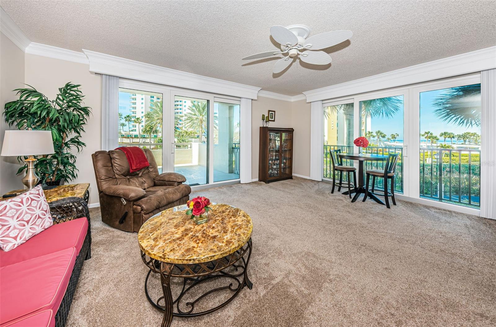 Spacious Great Room Offering an Abundance of Natural Light, Gulf Views & Generous Terrace!