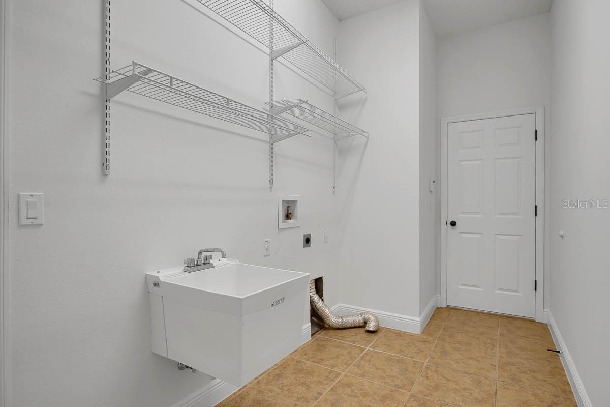 Extended laundry room with wet sink