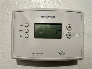 Honeywell Thermostat in Hallway.