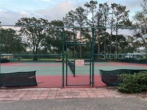 Tennis Court area with plenty of parking space, across from the Clubhouse.