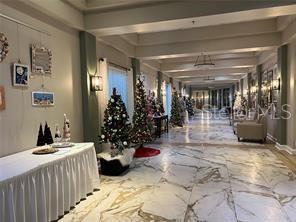 One of several hallways decorated for the holidays & shopping available!