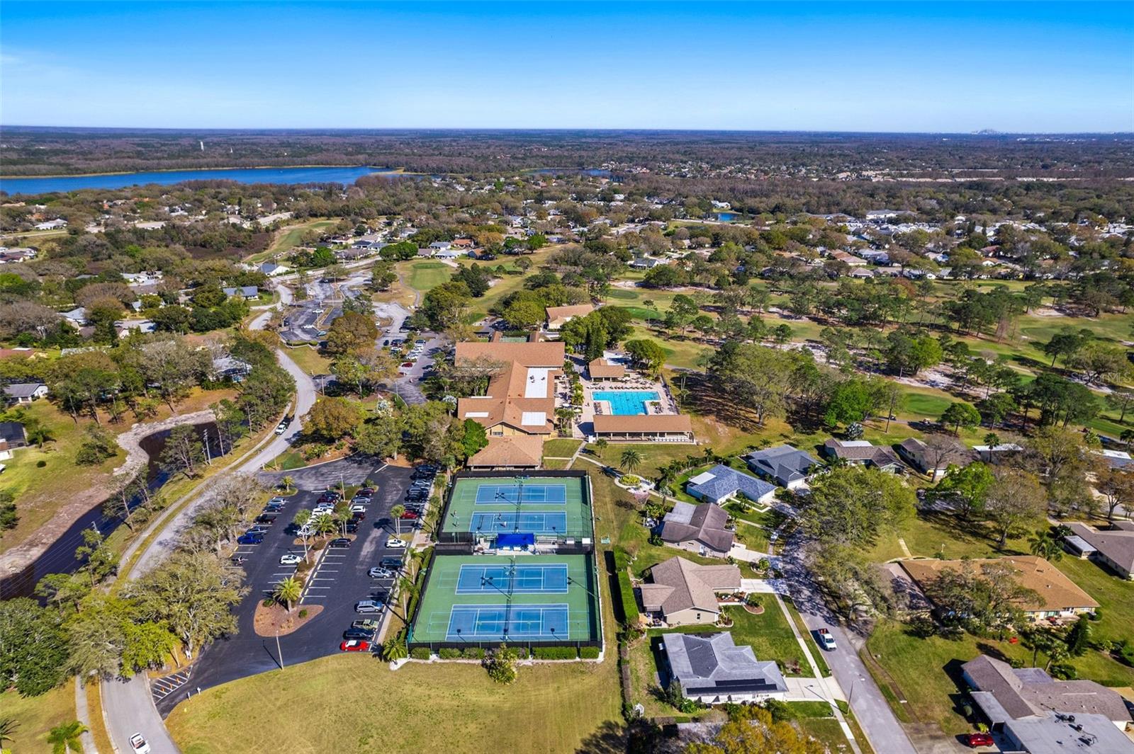 Clubhouse with Tennis Courts, Pickle Ball, Shuffle Board and Large Pool