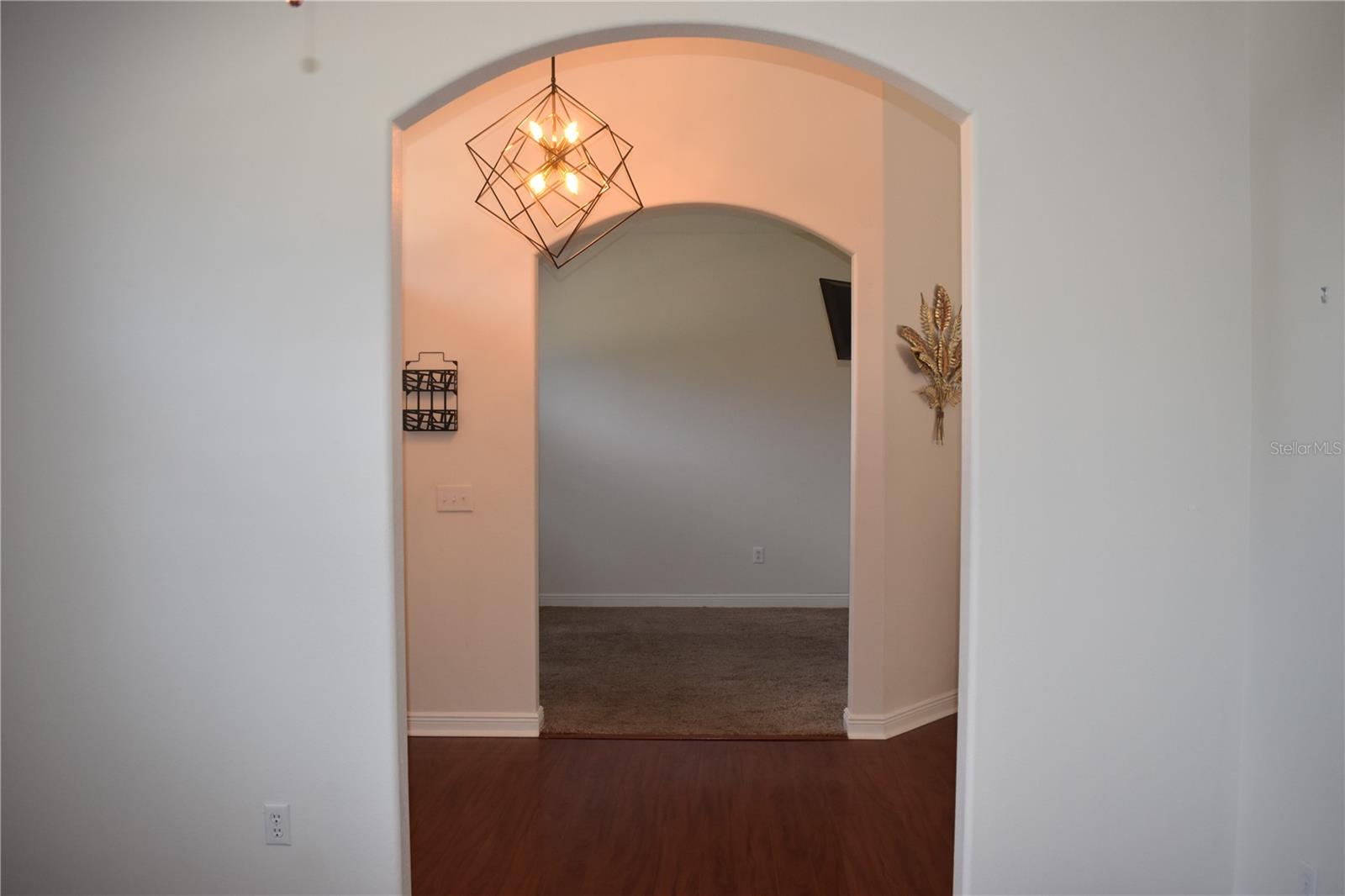 Foyer with office on left and diningroom om right opens to spacious family /kitchen