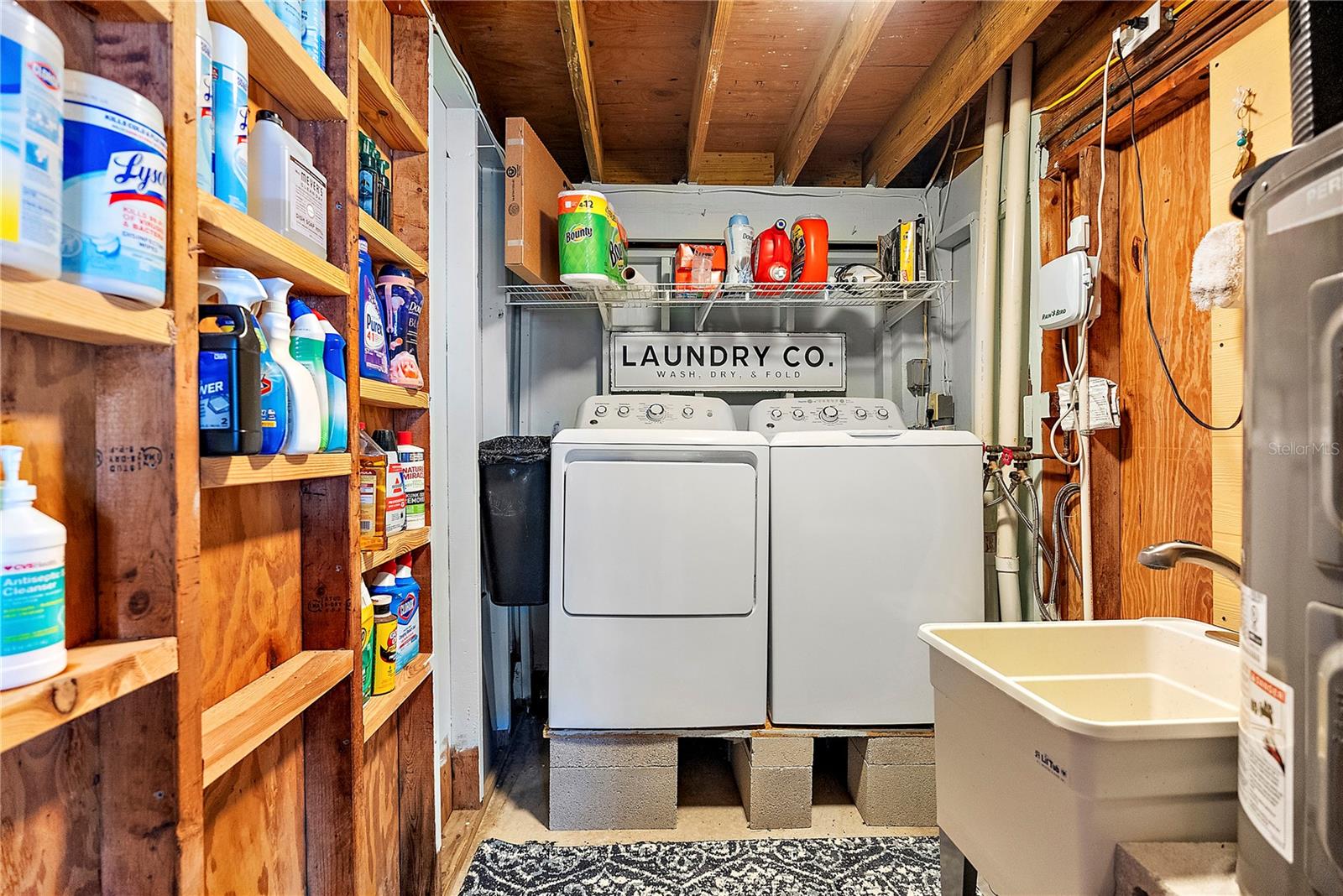 laundry area with utility sink