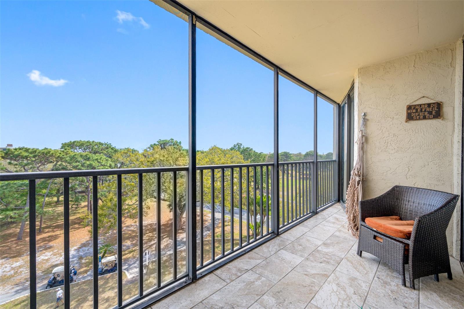 Lanai also has direct access from sliding doors of master bedroom. Great view overlooking the golf course.