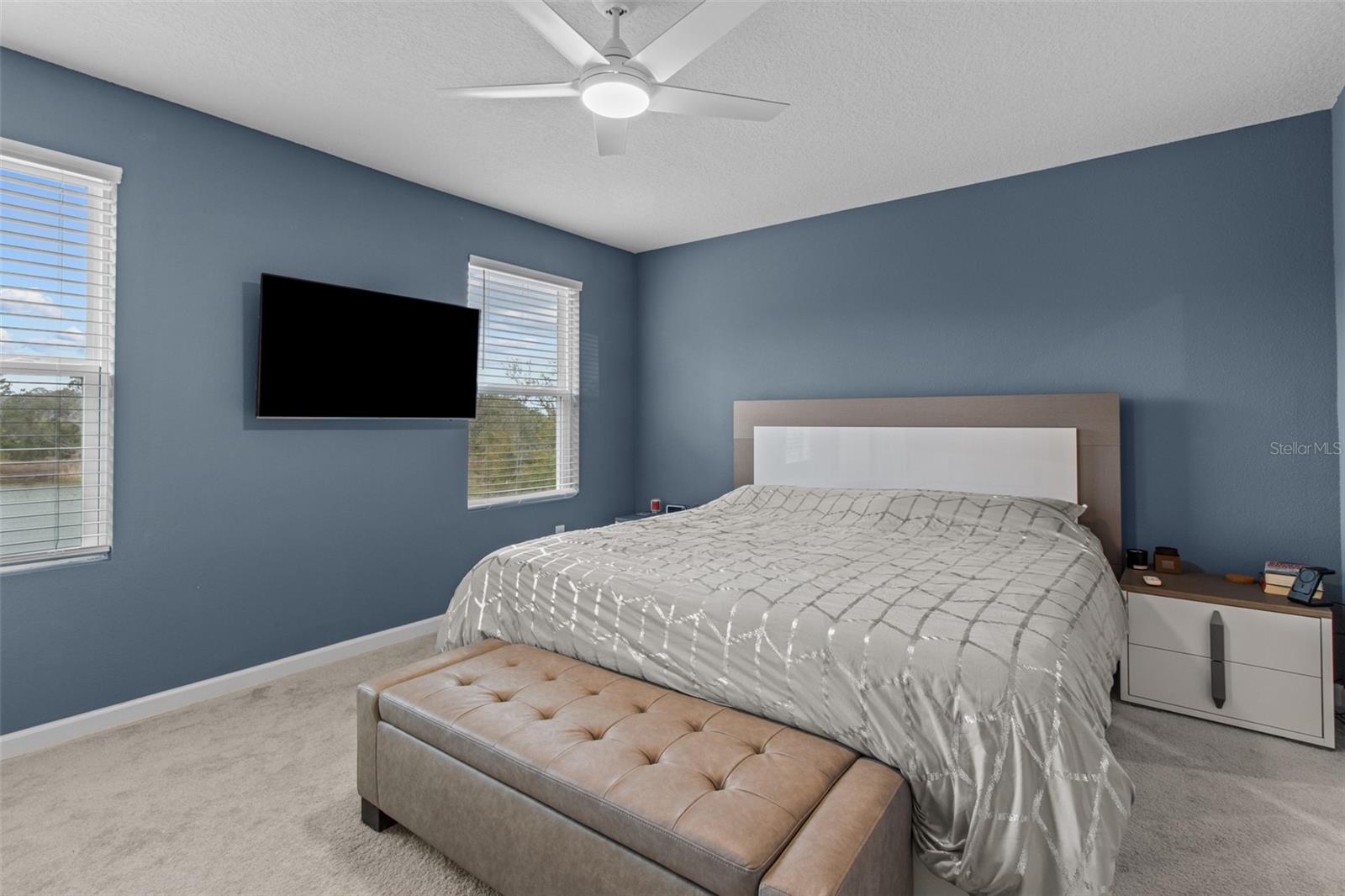 Spacious master bedroom offers plenty of natural light