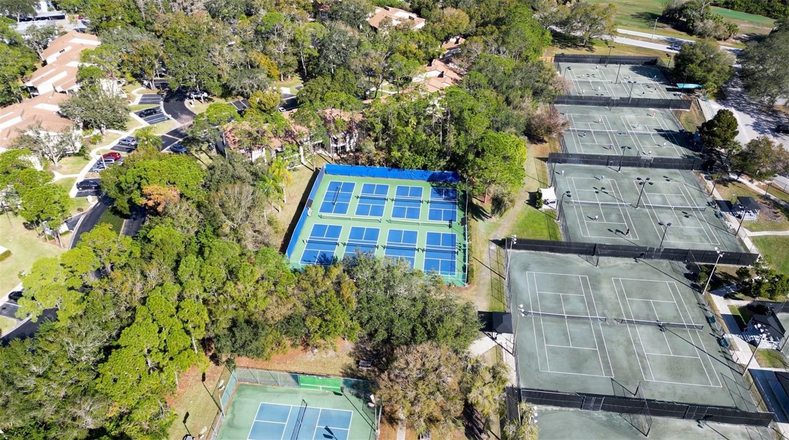 Tennis, Pkckleball, and sparkling pool available with Ardea Country Club membership.