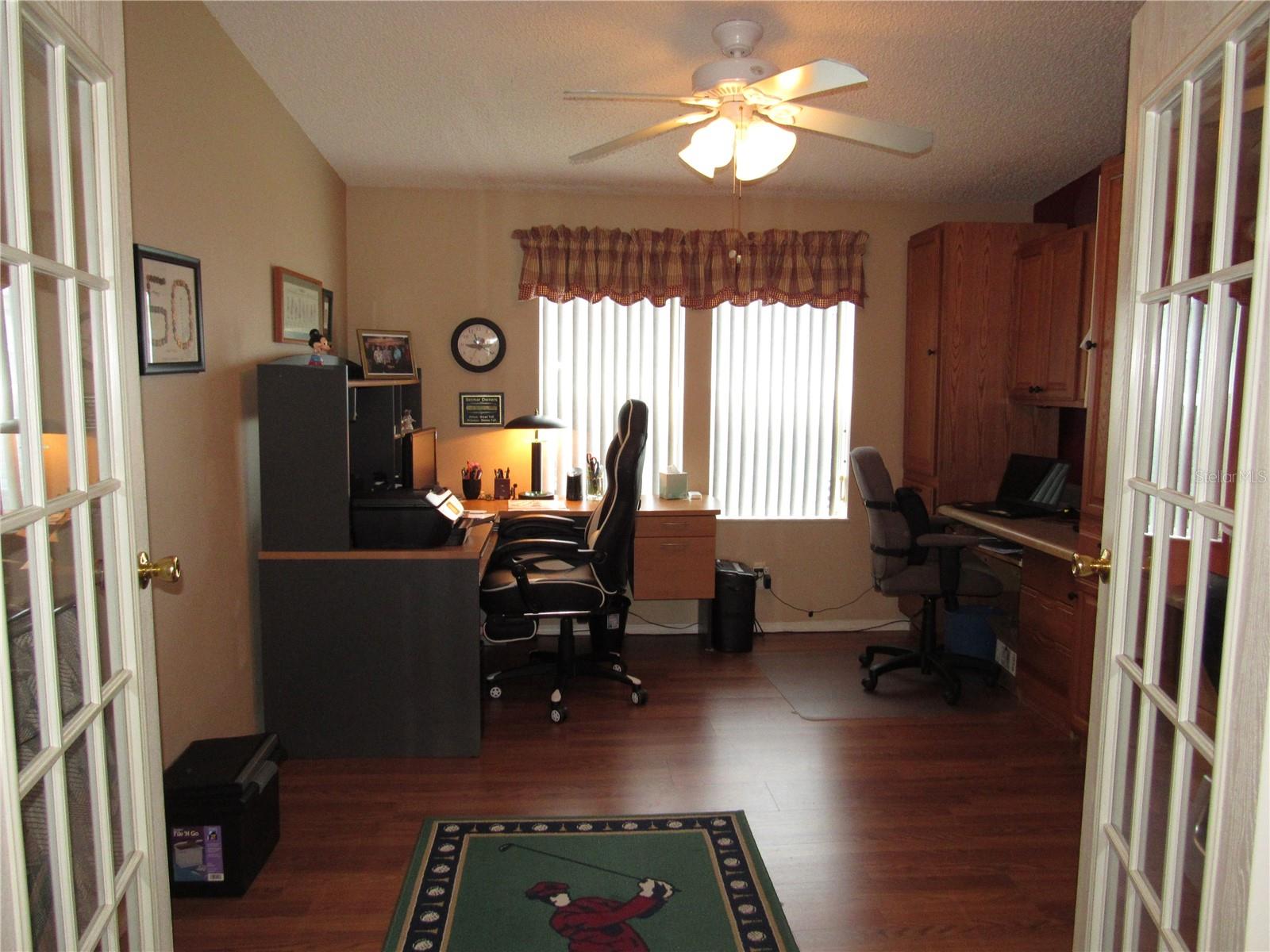 Office/den with French doors.