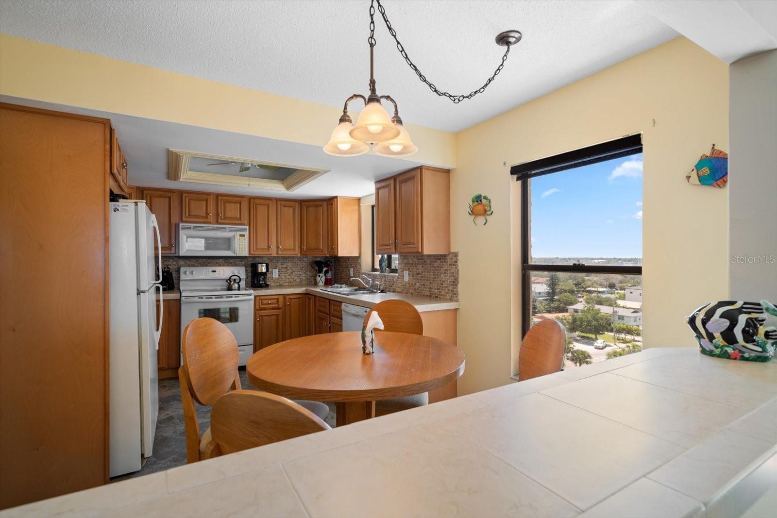 Kitchen has wonderful window to view East Parking and the Intracoastal.
