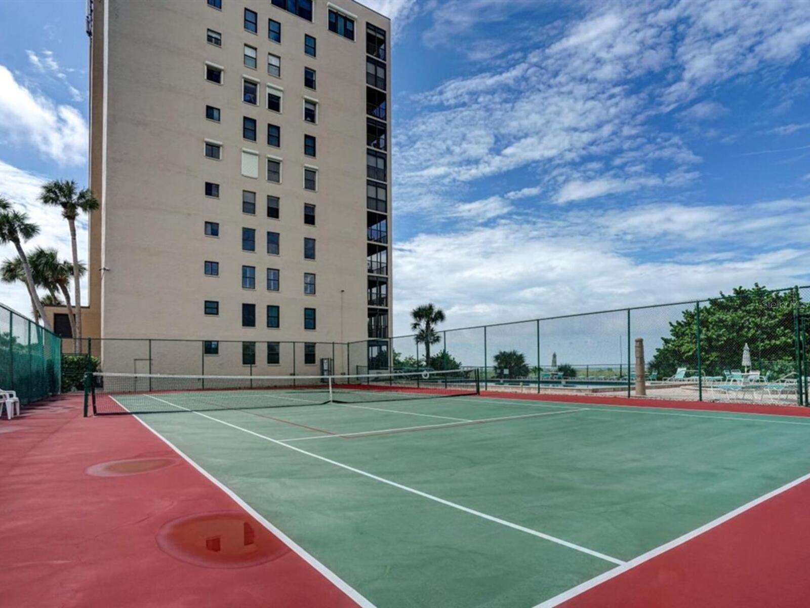 Tennis & Pickle Ball Court is available next to Swimming Pool & Spa.