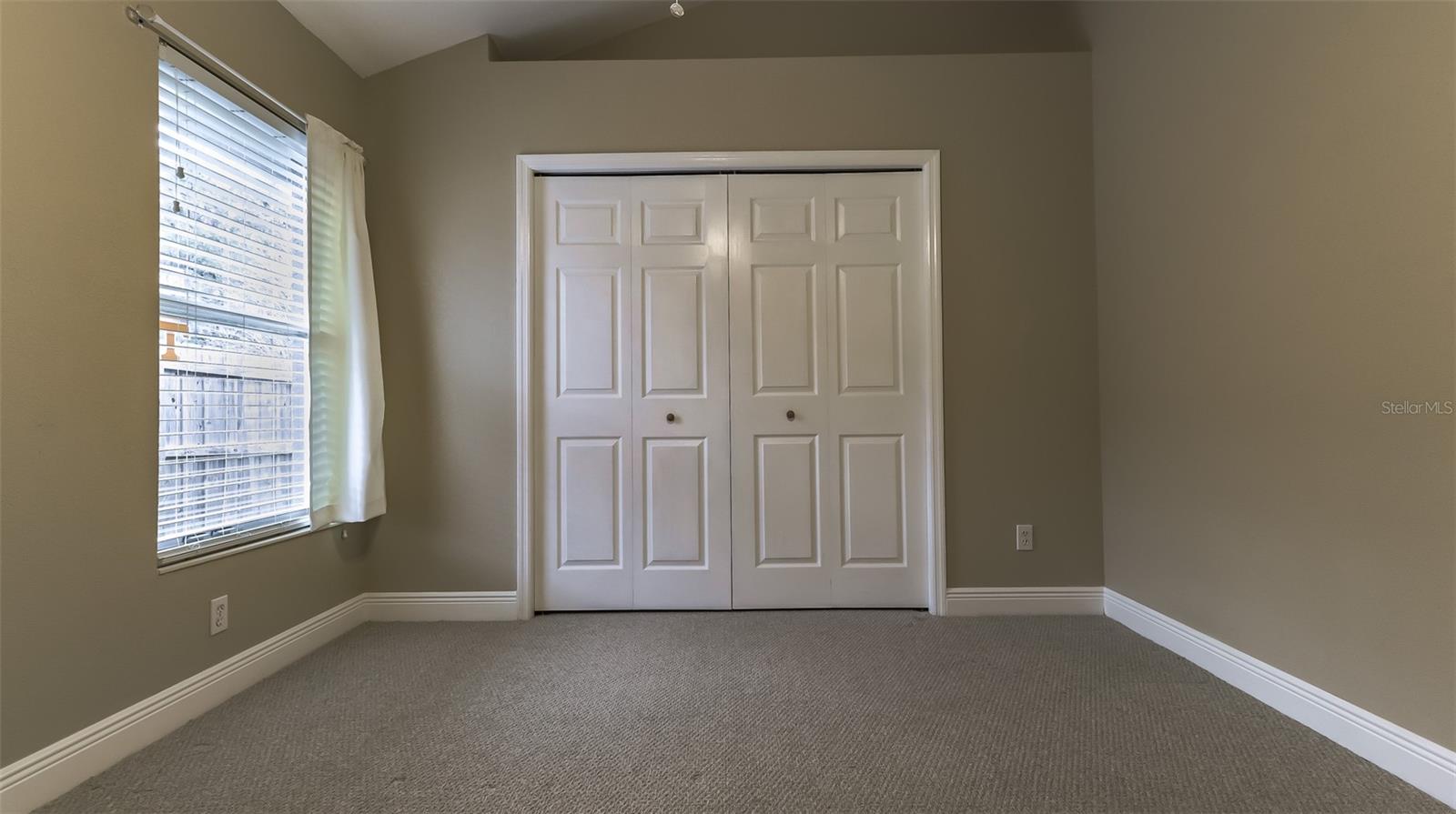 Large Bedroom with plush carpets
