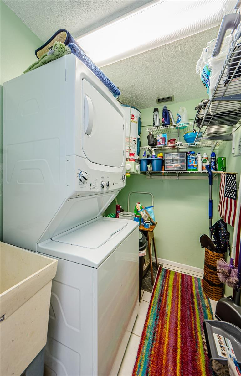 Spacious Laundry Room with Functional Sink.