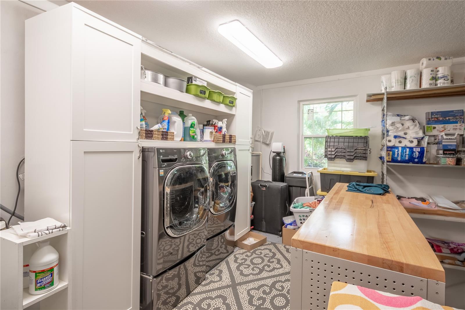 There is a built in laundry in  the garage with plenty of storage.