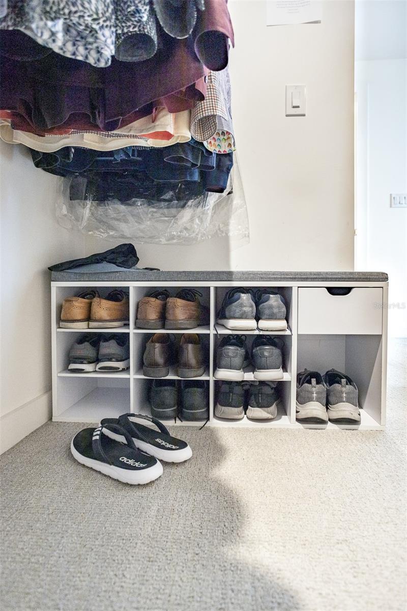 Shoe storage in Primary closet, so much room!
