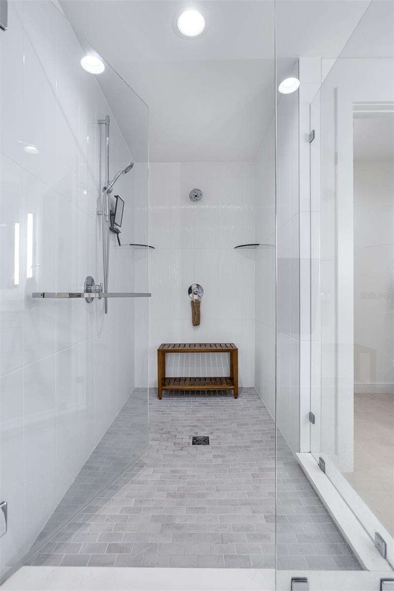 Large, walk-in shower in the Primary Bathroom