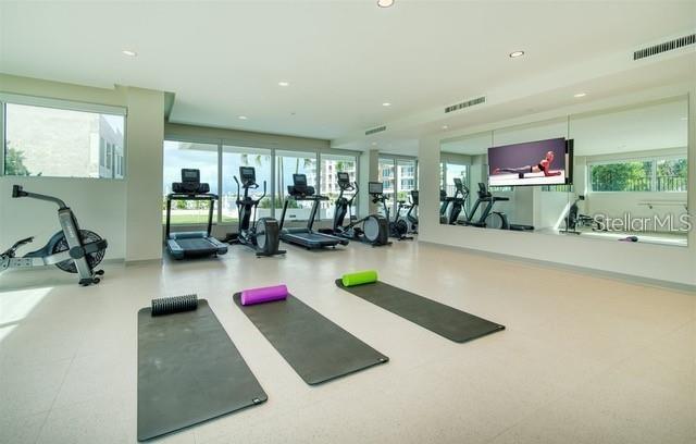 Run, work out or take a class in the Exercise Room in Marina Bay 880 overlooking the water