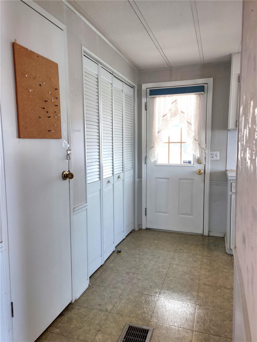 Washer/Dryer located in wall closet and next to closet pantry