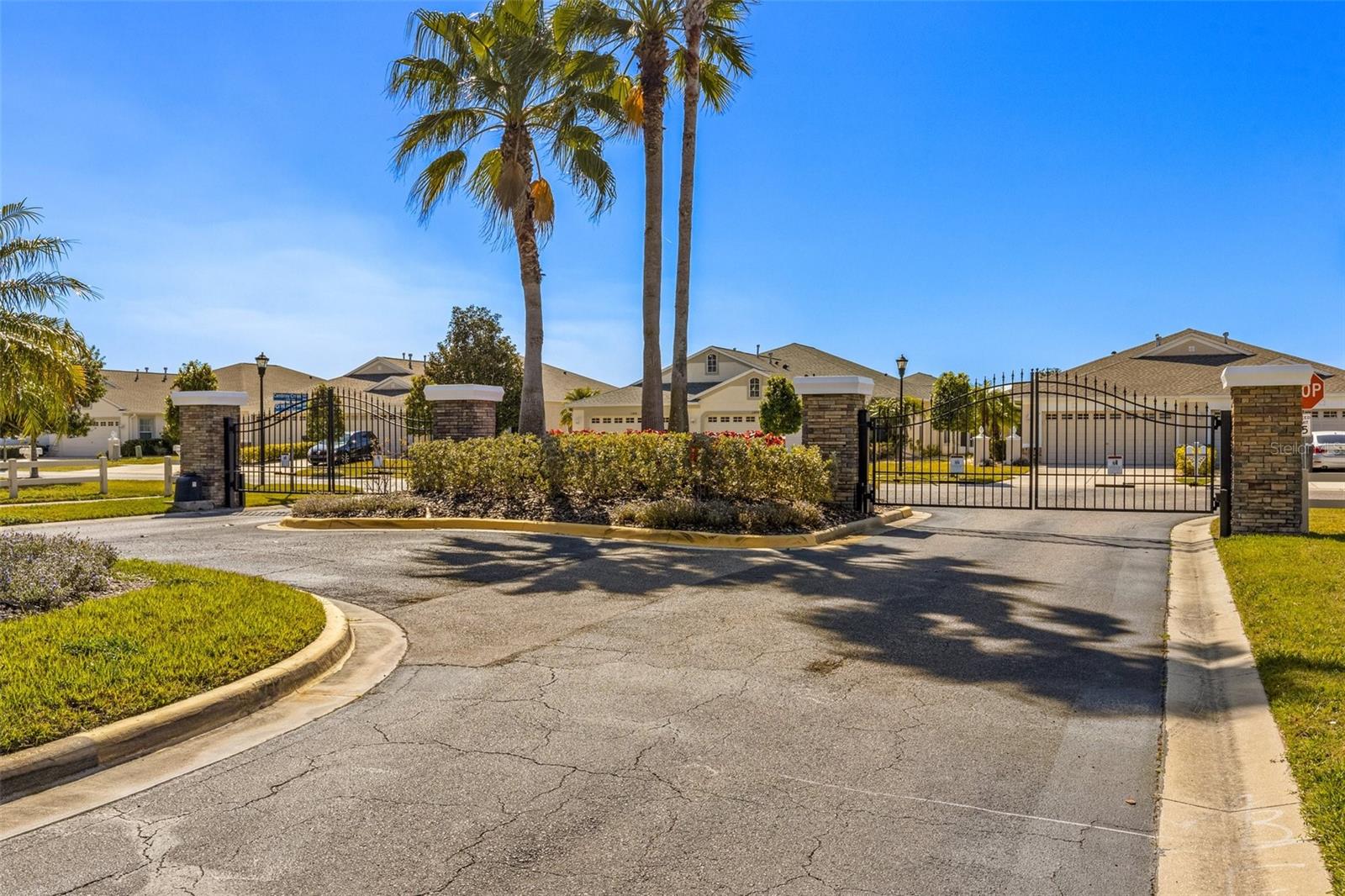 Gated Villa Community Looks so pretty all the way around the Loop!