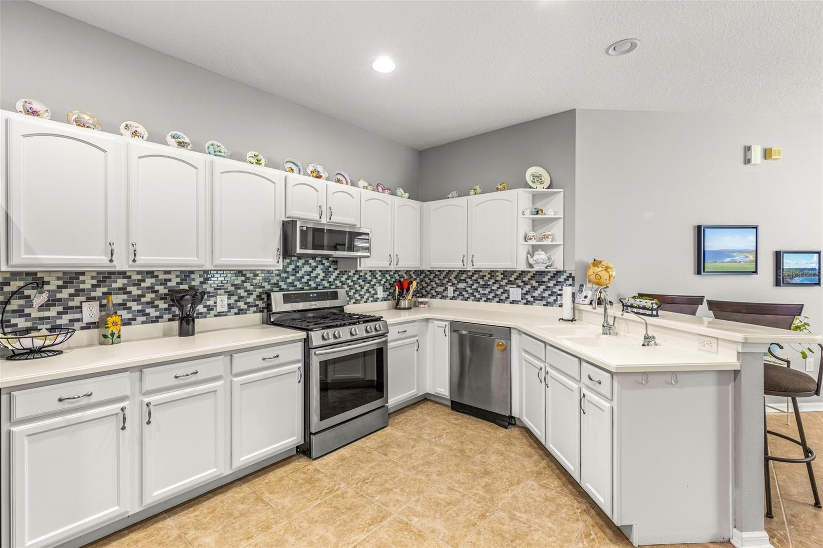 Kitchen has large Entertaining or Cooking Space!  Plenty of Storage and Counters!