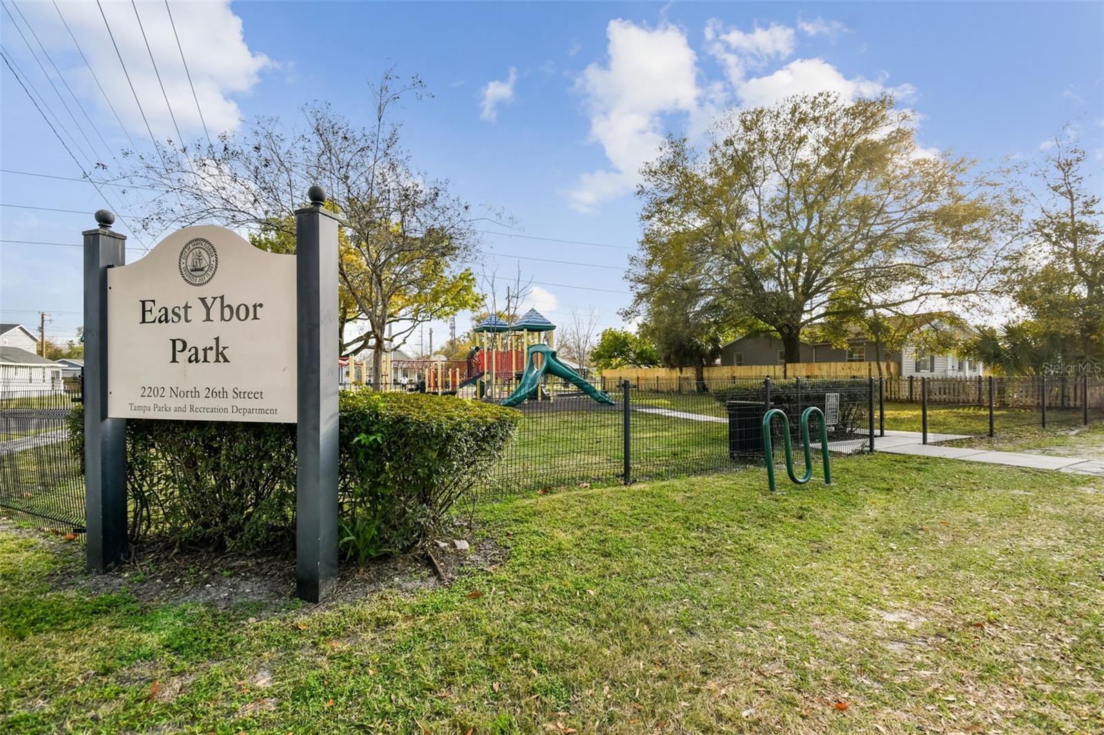 Beautiful East Ybor Pocket Park with playground, pavilion, greenspace, & basketball courts!
