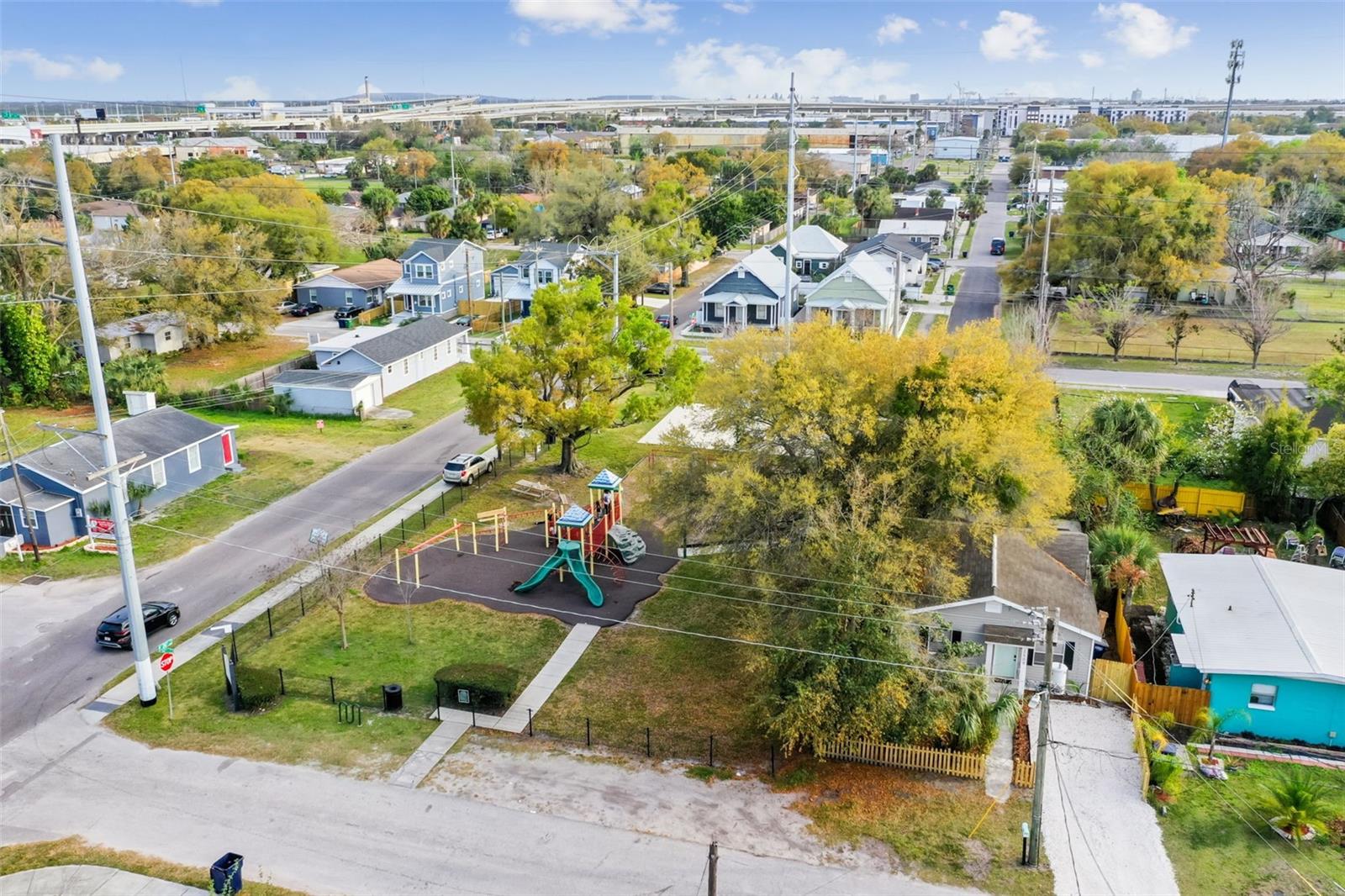 Beautiful East Ybor Park surrounds property to East and South sides! Left side yard and back yard view the park!