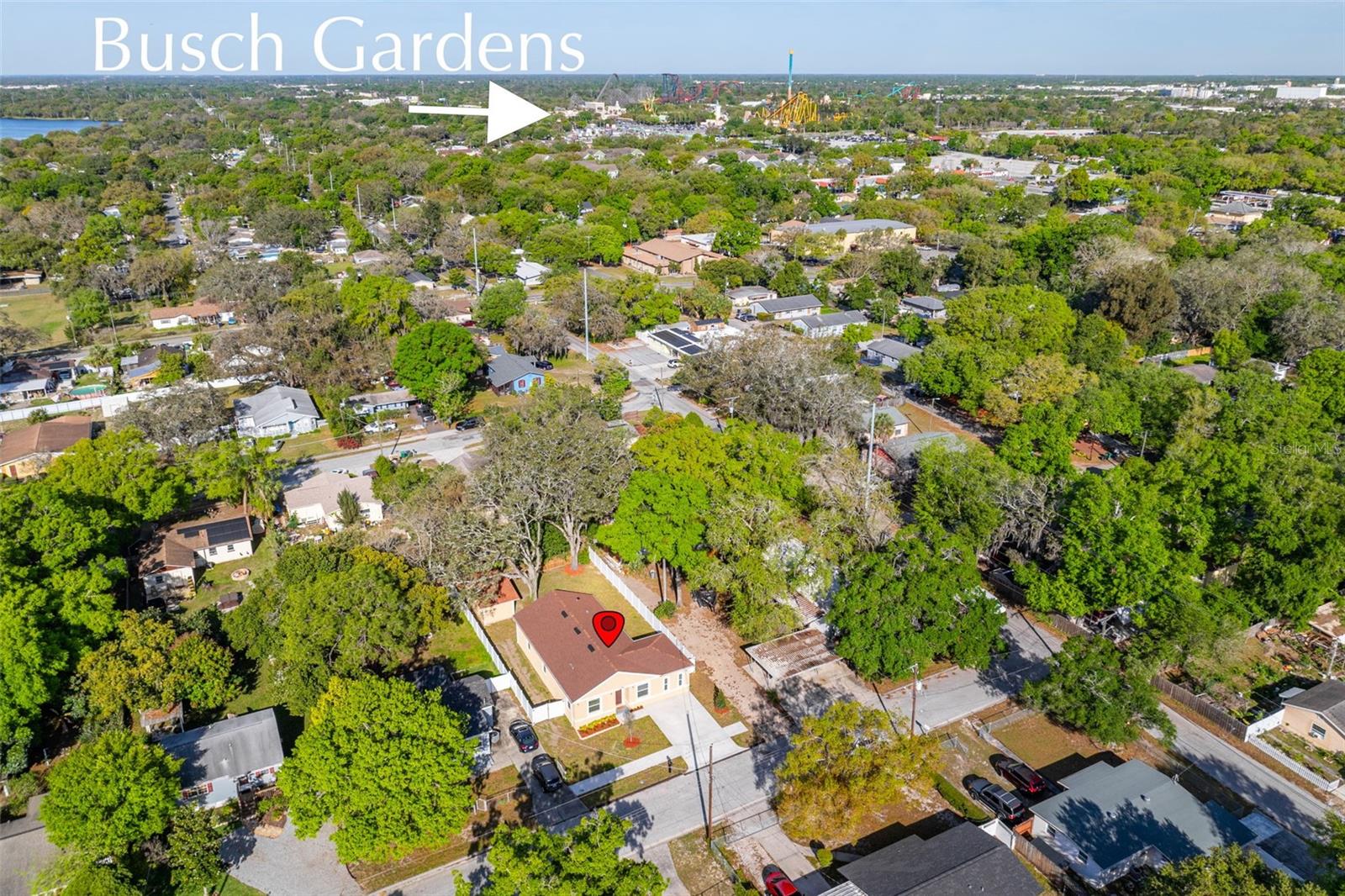 Aerial- House (shows property house w shed, fence,..)with BUSCH GARDENS in distance -marked