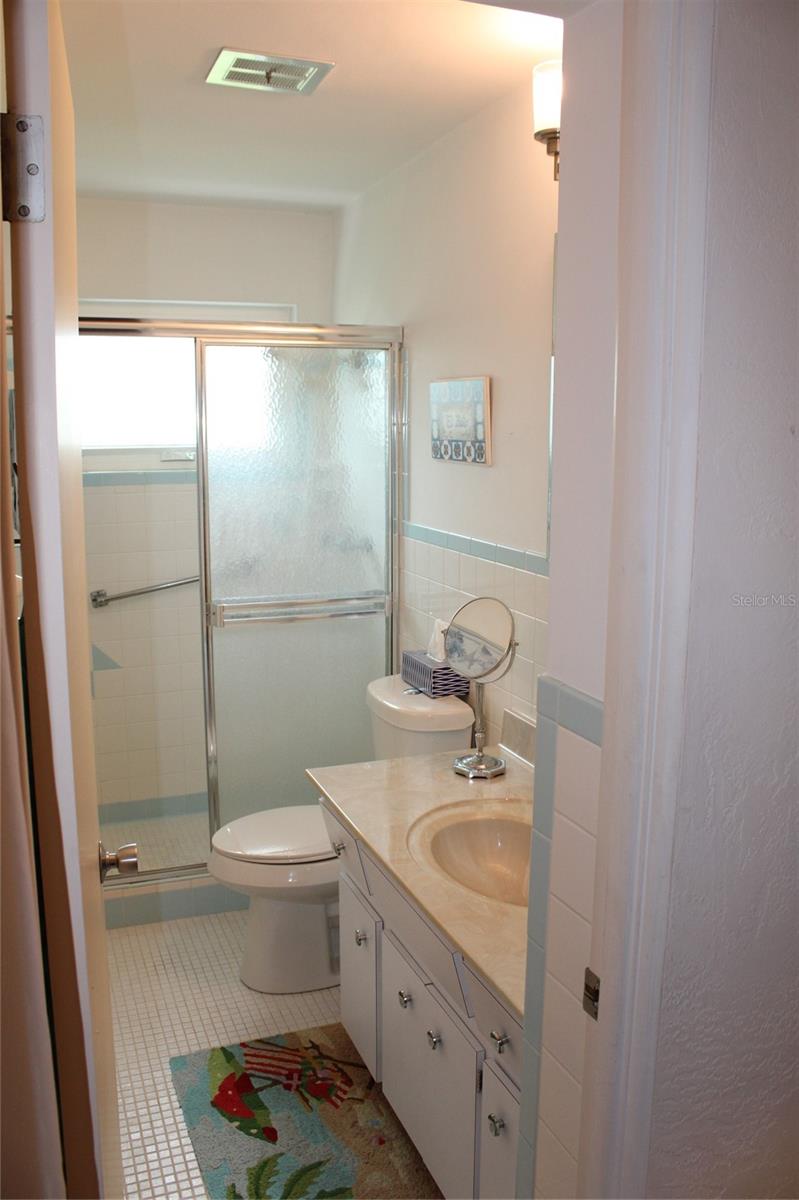 Entrance to the Primary Bathroom with built in shower
