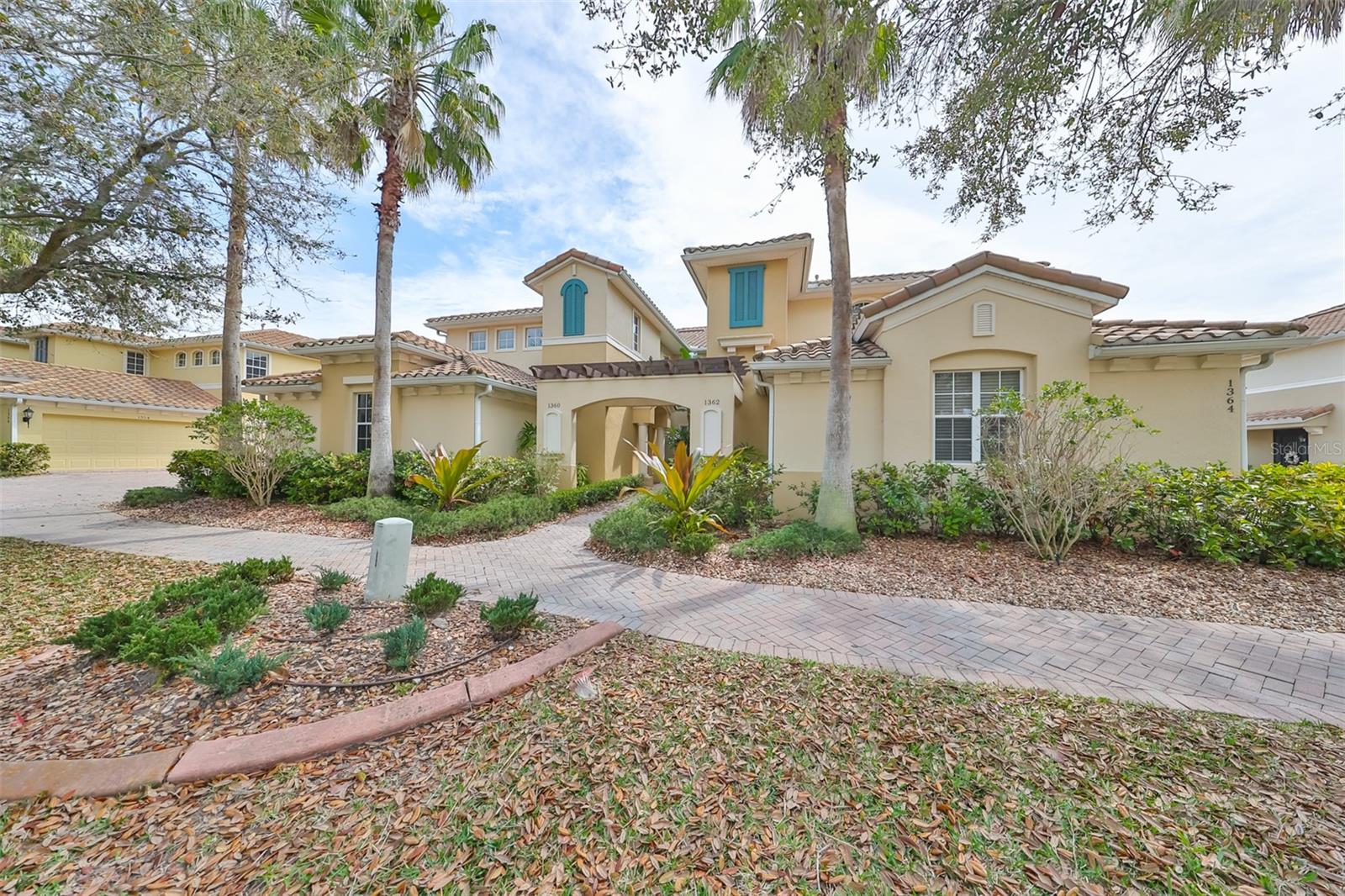 Pride of home ownership is everywhere in this community. With custom pavered sidewalks and driveways, lighted streetlamps, beautiful oaks and tall swaying palm trees, this is considered one of the prettiest streets in all of Sun City Center.