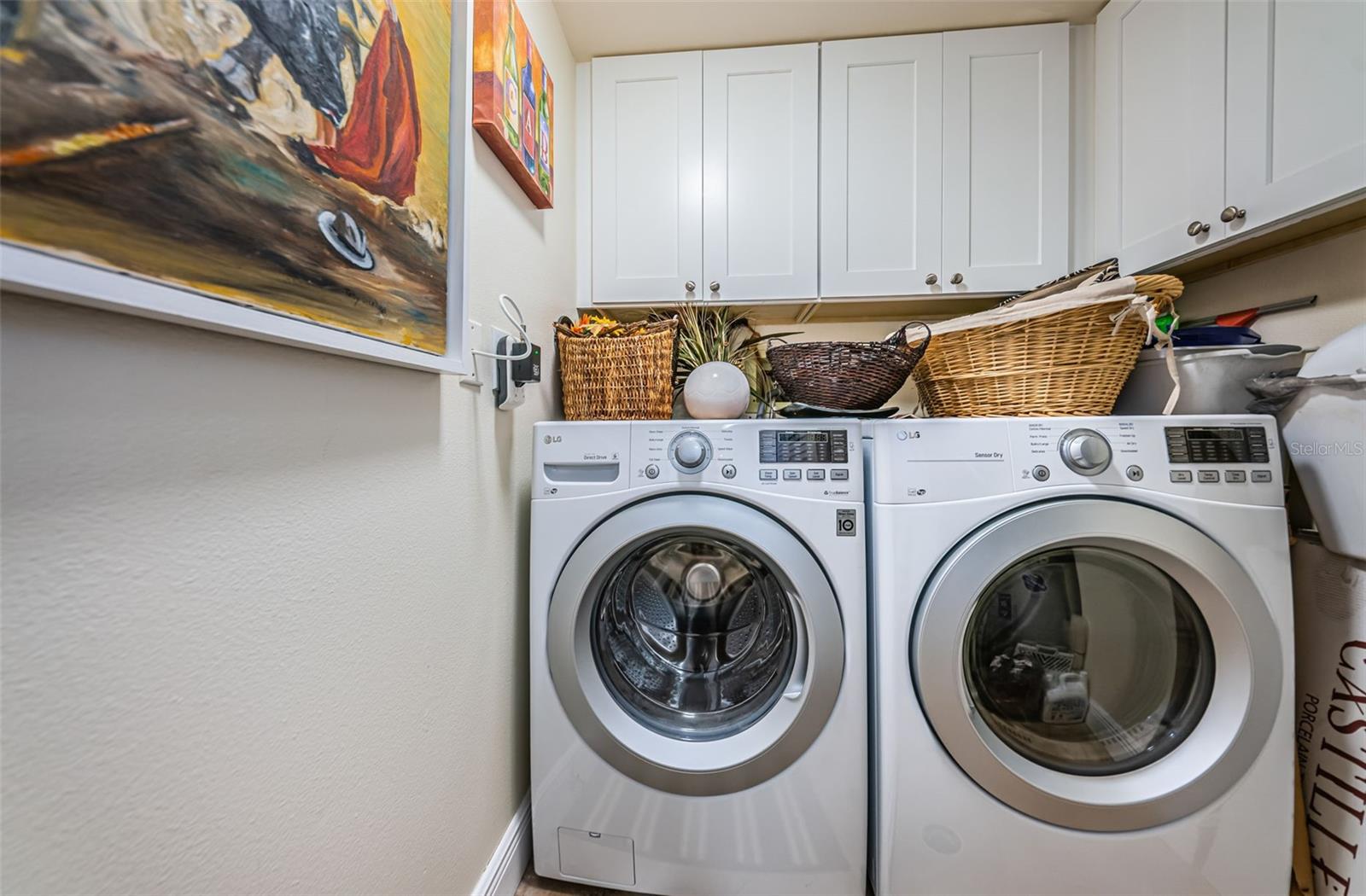 Inside Utility Room with full sized washer & dryer