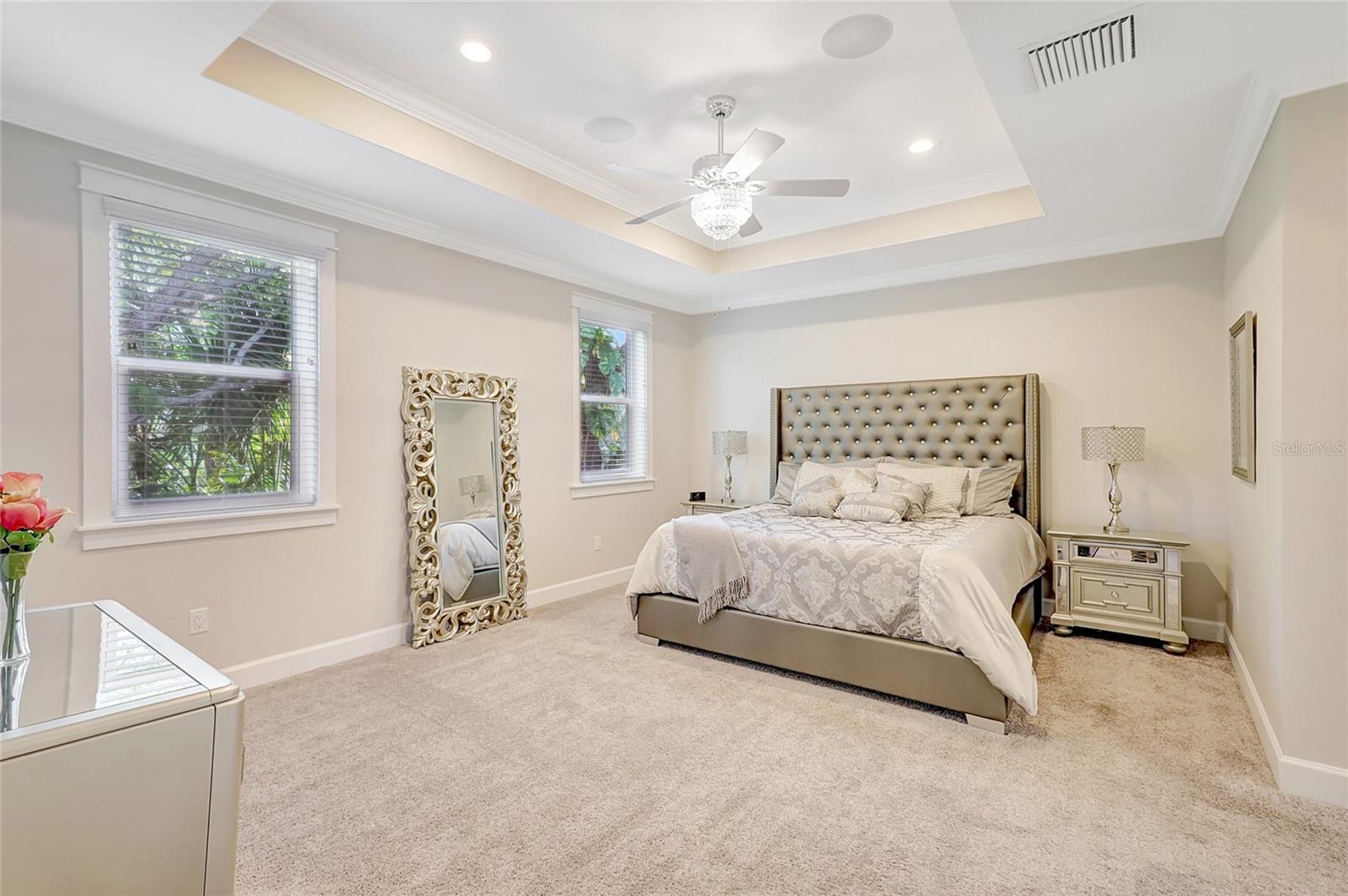Luxurious Primary Bedroom with Tray Ceiling, in ceiling speakers