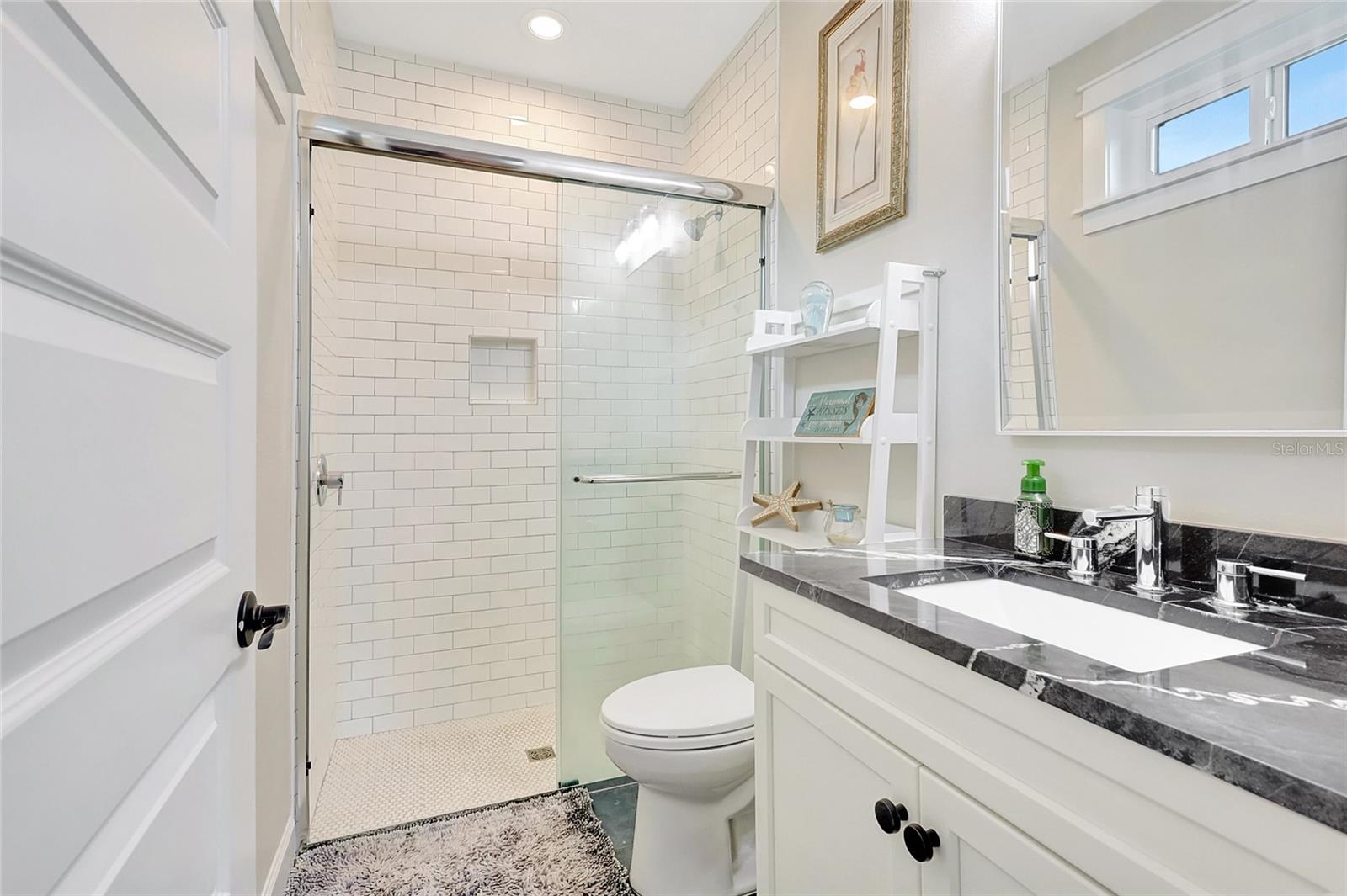 Bedroom Three's ensuite with subway tile